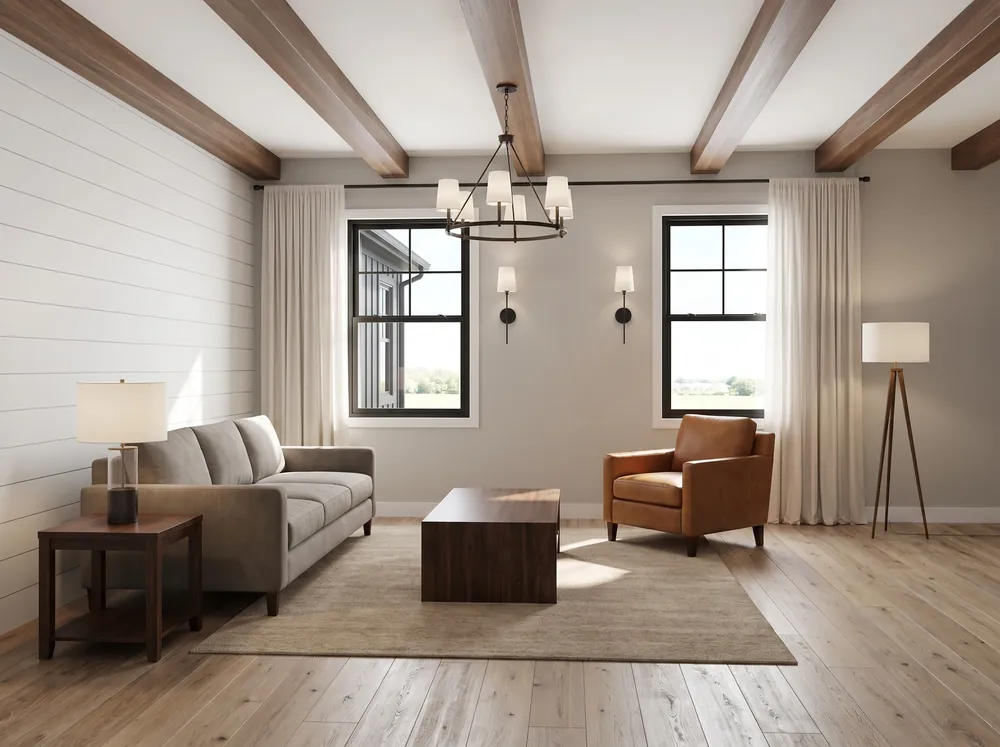 Living room with beamed ceiling, iron chandelier, sofa, leather armchair and area rug