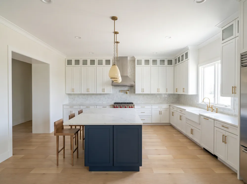 Kitchen 270 degree view facing west: full cabinet run with hood, island and stools